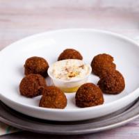 Falafels Plate · Chef's famous crispy falafels made to perfection.