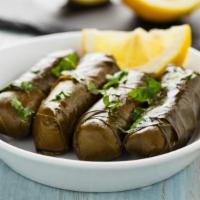 Dolmeh · Classic dolmeh made with vegetarian stuffed grape leaves filled with rice, seasoning and her...