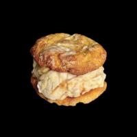 Gooey Butter Cake Cookies W/ Butter Brittle Cake Ice Cream · Yellow Cake Cookies dipped in Powdered Sugar with a Vanilla Bean Ice Cream Layered w/ Butter...
