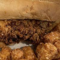 Sriracha Maple Chicken Sandwich & Tater Tots · Naturally raised chicken breast, buttermilk battered and fried, drenched in sweet and spicy ...