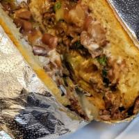 Torta · Toasted Mexican torta bun, beans, choice of meat, lettuce, cheese, mayo, tomato, guacamole, ...