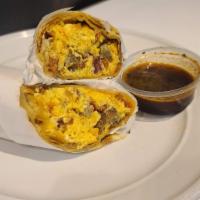 Sausage And Bacon Burrito · Sausage links, bacon, cheese, eggs, flour tortilla. Served with Fries.