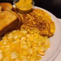 Denver Omelette · Smoked Ham, bell pepper, red onion, cheddar/ jack cheese mix, 2 eggs. Served with 2 wheat to...