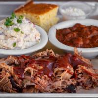 Pulled Pork Dinner · 1/2 pound pork shoulder, marinated with our dry rub, slow-smoked 14-16 hours, hand-pulled an...