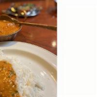 Chicken Tikka Masala · Chicken cooked in onion sauce and spices.
