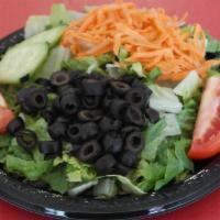 Garden Salad · Mixed Greens, Tomatoes, Cucumbers, Olives and Carrots.