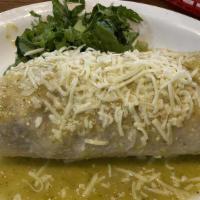 Wet Burrito · Your choice of meat.  A flour tortilla filled with beans rice cheese cilantro onion sour cre...