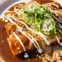 Rojas Chicken Enchiladas · Three marinated chicken with two-cheese blend enchiladas topped with red sauce, crema fresca...