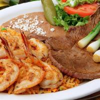 Mar Y Tierra · Top sirloin steak and four shrimp and style.