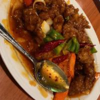 Beijing Beef · Spicy. Crispy strips of beef, bell peppers, carrots, and onions covered with our deliciously...