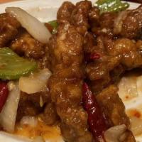 Dynamite Beef · Spicy. Crispy strips of marinated beef tossed with sugar ginger, garlic, and chili in our ch...