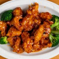 Sesame Chicken · Spicy. Lightly battered boneless chicken bites, covered in a deliciously sweet sauce sprinkl...