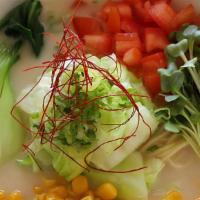 Hot Creamy Ramen · Contains soy. Vegan soy-based broth. Noodles, corn, diced tomato, bok choy, kaiware, cabbage...