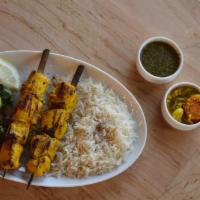 Chicken Kabob · Charbroiled, boneless chicken breast infused in house marinade. Served with white rice, sala...