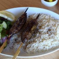 Beef (Koobideh) Kabob · Charbroiled skewer of ground sirloin, seasoned with onions and served with salad and rice.