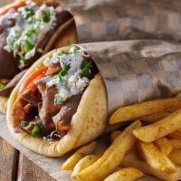 Gyro  · Comes with tomato, lettuce and onion, topped with fresh cucumber sauce
