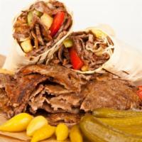 Shawarma (Beef) · Shawarma is well-marinated meat with spice mixture, cooked in its own juices and fat-until p...