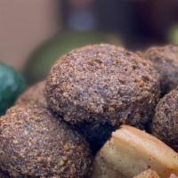 Falafel · Our Falafel is a crispy on the outside and soft on inside delicious deep-fried and mainly ma...