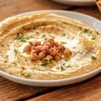 Hummus · Our creamy hummus is delicious made from chickpeas, Tahini, lemon juice and Garnished with o...
