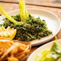 Tabbouleh · Our Tabbouleh made of finely chopped parsley, diced cucumber with tomatoes, mint, red onion,...