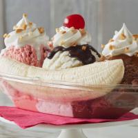Banana Split Sundae · Three scoops of ice cream, chocolate, strawberry, and sweet cream, 2 banana halves, 3 syrups...