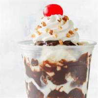 Classic Sundae · Vanilla Ice Cream, Hot fudge, Whipped Topping, Peanuts, and Cherry.