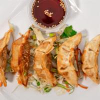 Gyoza (5 Pieces) · Pan-Fried wonton with minced chicken served with homemade soy sauce.