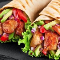 Chicken Shawerma Wrap · Fresh Wrap made with Marinated and flame broiled chicken, tomatoes, lettuce, garlic sauce an...