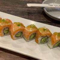 Yuzu Salmon Roll · Cucumber avocado roll topped with salmon and lemon