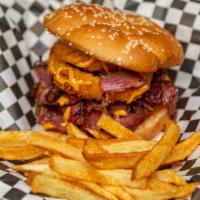 The Pastrami Cheeseburger · A toasted Brioche bun, with a freshly made meaty burger patty, topped with a generous portio...