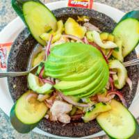 Aguachile · Raw shrimp aguachile in our special red chiltepin sauce or green tomatillo sauce