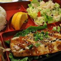 Salmon Bento Box · Salmon steak, teriyaki sauce,  japchae noodle, white rice, 3pcs chicken&veggie dumplings wit...