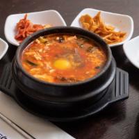Assosrted(Seafood+Beef) Soon Tofu · Sizzling Korean stew with mixed seafood, beef, extra soft tofu, mushroom and zucchini comes ...