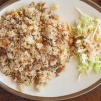 Bulgogi Fried Rice · Wok-fried rice with rib-eye slices, onion, mushroom, zucchini, carrots