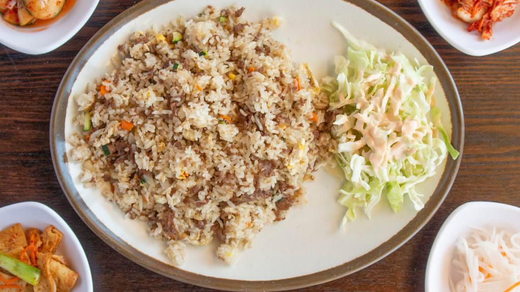 Bulgogi Fried Rice · Wok-fried rice with rib-eye slices, onion, mushroom, zucchini, carrots
