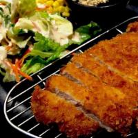 Pork Katsu · Tenderized fresh pork loin cutlet w/ side cabbage& corn salad, katsu sauce with white rice and