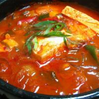 Kimchi Chigae 김치찌개 · Kimchi stew with pork, onion, scallion, jalapeno, and tofu come with white rice