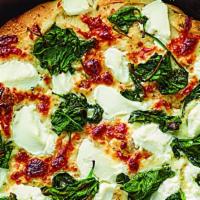Spinach Ricotta Pizza · White cream sauce, mozzarella, spinach, and ricotta. That's a f*cking good pizza.