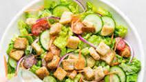 House Salad · House salad with seasonal vegetables and our house dressing on the side. Of course it's frea...
