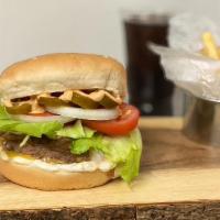 Jalapeño Cheeseburger Meal · Classic beef patty, spicy spread, cheese, lettuce, tomato, onion, & jalapeños on a sesame bun.