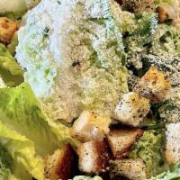Little Gem Caesar Salad · baby gem lettuce, chives, parmesan, house-made croutons, house-made caesar dressing