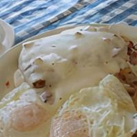 Chicken Fried Steak & Eggs · Chicken fried steak topped with homemade country gravy and served with
Home fries or hash br...