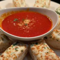 Garlic Cheese Bread · Garlic Cheese Bread served with our house made marinara for dipping