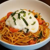 Spaghetti Checca · House made spaghetti, fresh tomatoes, basil, garlic, olive oil, burrata cheese.