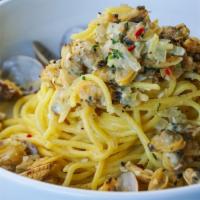 Spaghetti Clams · House made spaghetti, baby clams, olive oil, onions, garlic, parsley, in a white wine sauce.