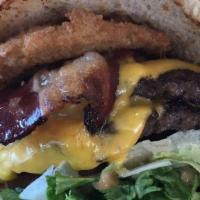 Frosty Boss · Fresh patties, bacon, onions ring, thousand islands, pickles, lettuce, onion, tomatoes.