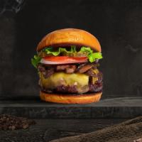 Mushroom Mania Vegan Burger · Seasoned 100% Beyond burger patty topped with mushrooms, melted vegan cheese, lettuce, tomat...