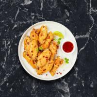 Sweet Chili Thrill Wings · Fresh vegan chicken wings breaded, fried until golden brown, and tossed in sweet chili sauce...