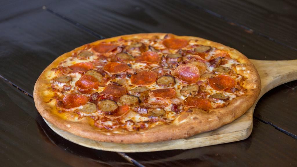 Meat Lover Pizza · Pepperoni, Bacon, Sausage, Pizza Sauce, Mozzarella Cheese.