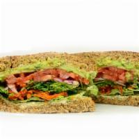 Supreme Veg Out Sandwich  · avocado, crispy carrots, sunflower seeds, red onion, tomato, cucumber, red leaf lettuce, sun...